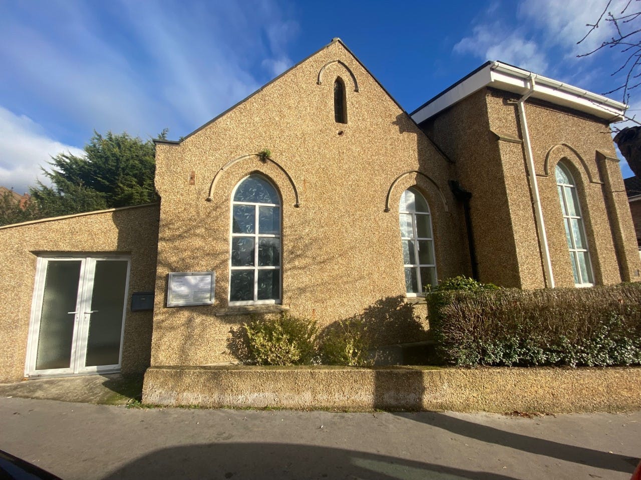 Banquet hall at Foulsham Hall with large windows, perfect for events and gatherings.