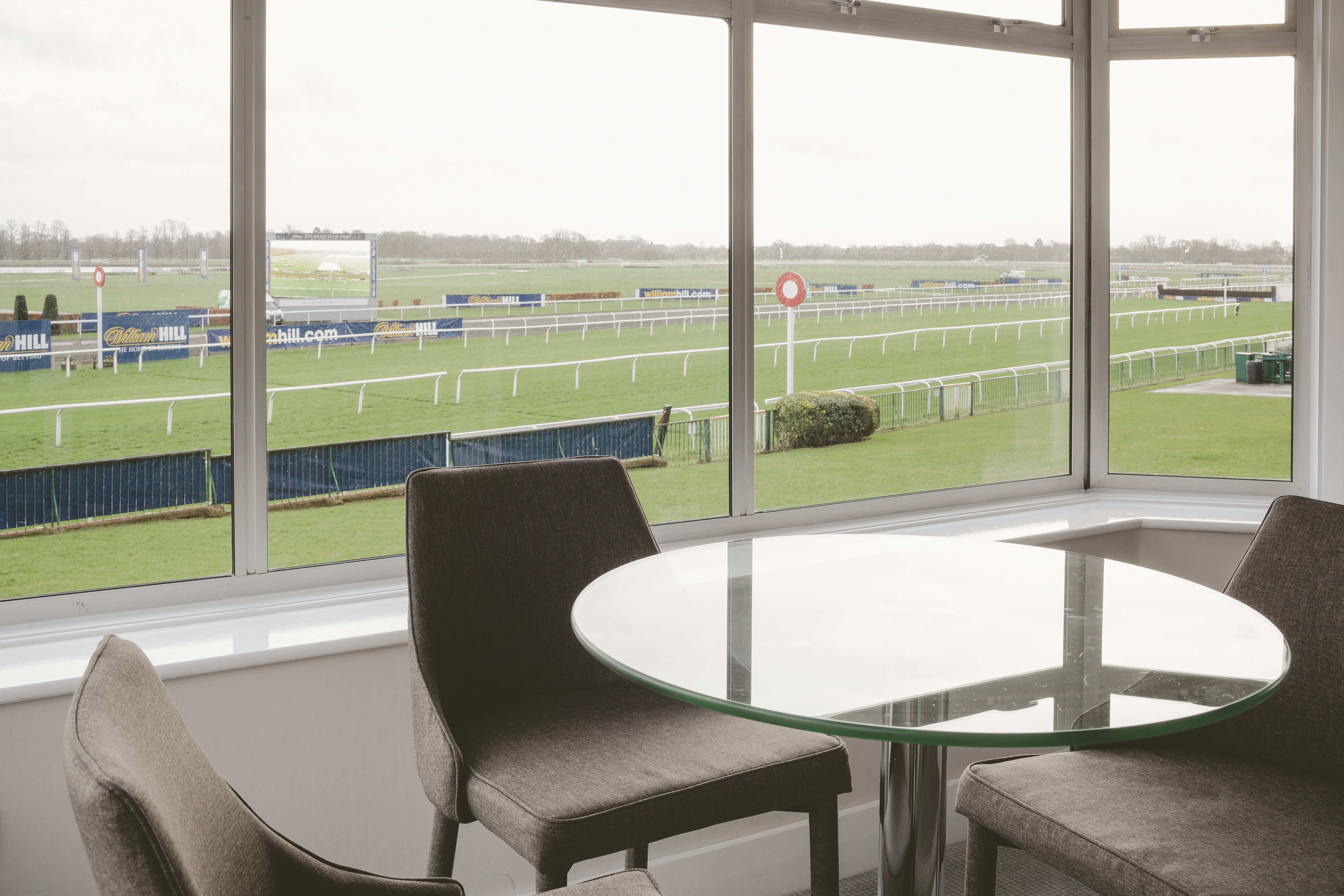 Royal Box at Kempton Park Racecourse, modern space for corporate events and gatherings.