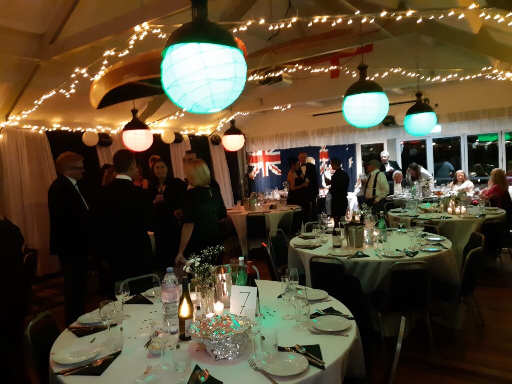 Elegant dinner setup in Hurlingham Yacht Club's dry dock, perfect for networking events.