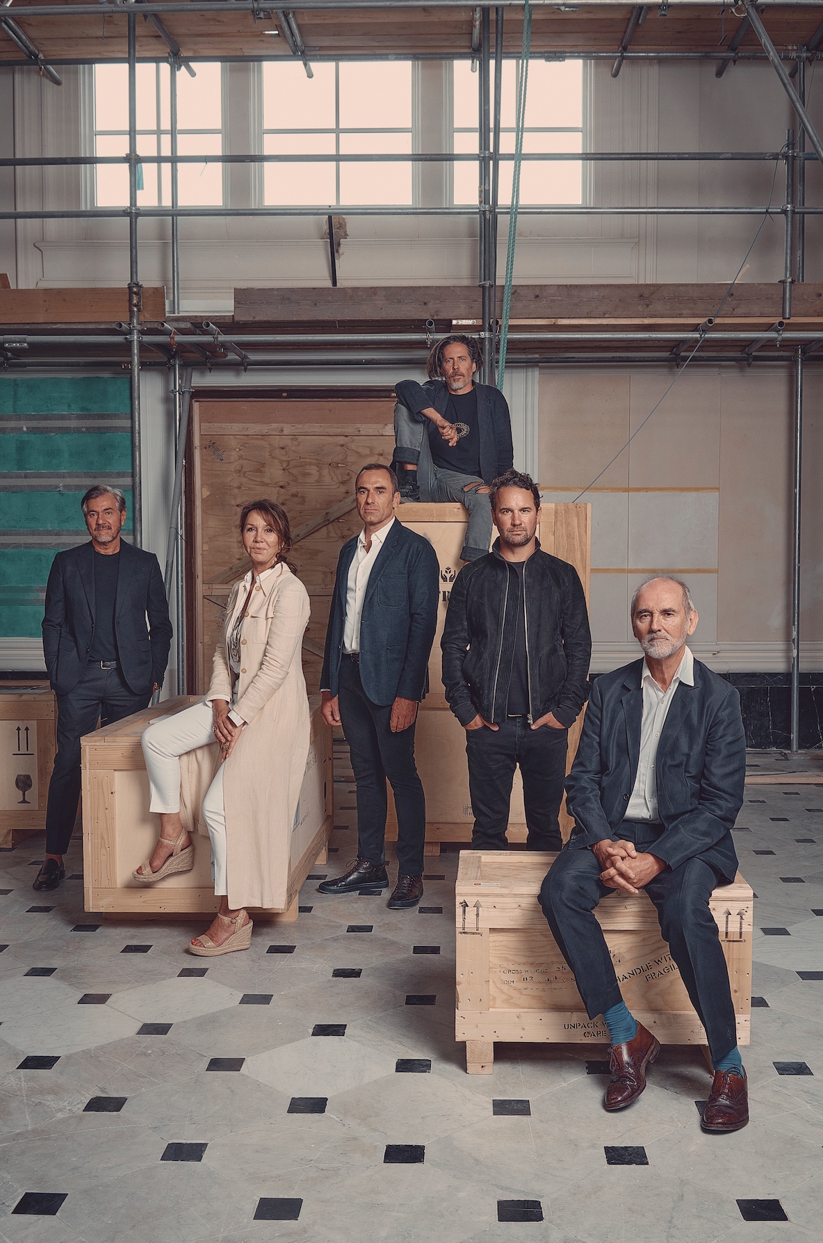 Diverse professionals in a creative workspace, ideal for networking events and meetings.