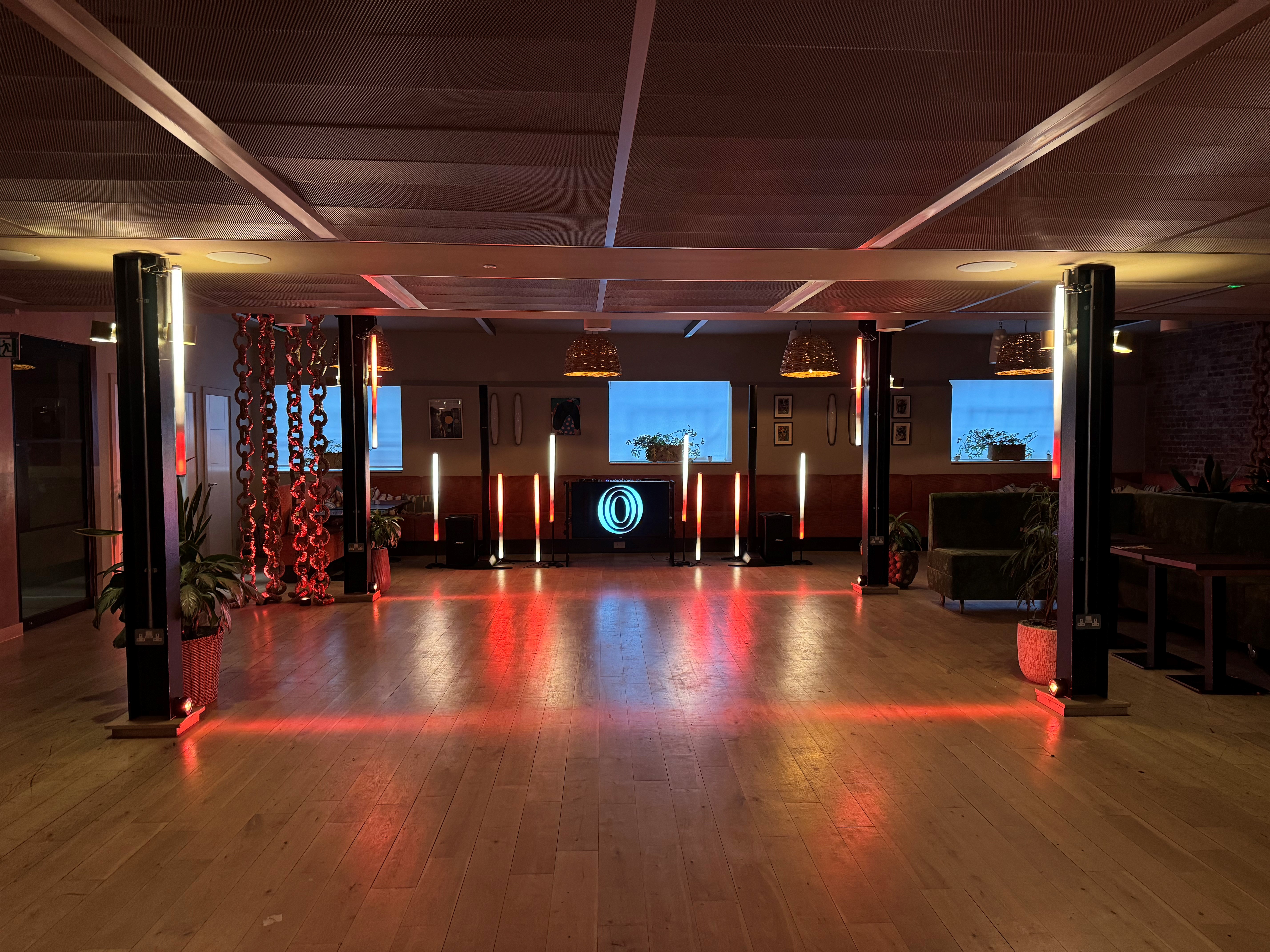 Ubuntu Lounge event space with modern lighting for corporate meetings and social gatherings.