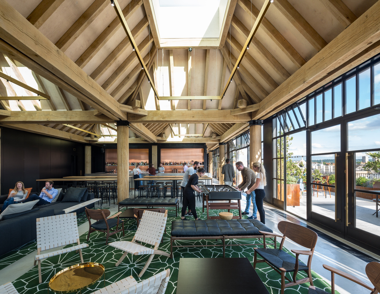 Modern open-concept meeting space with high ceilings for networking events and brainstorming.