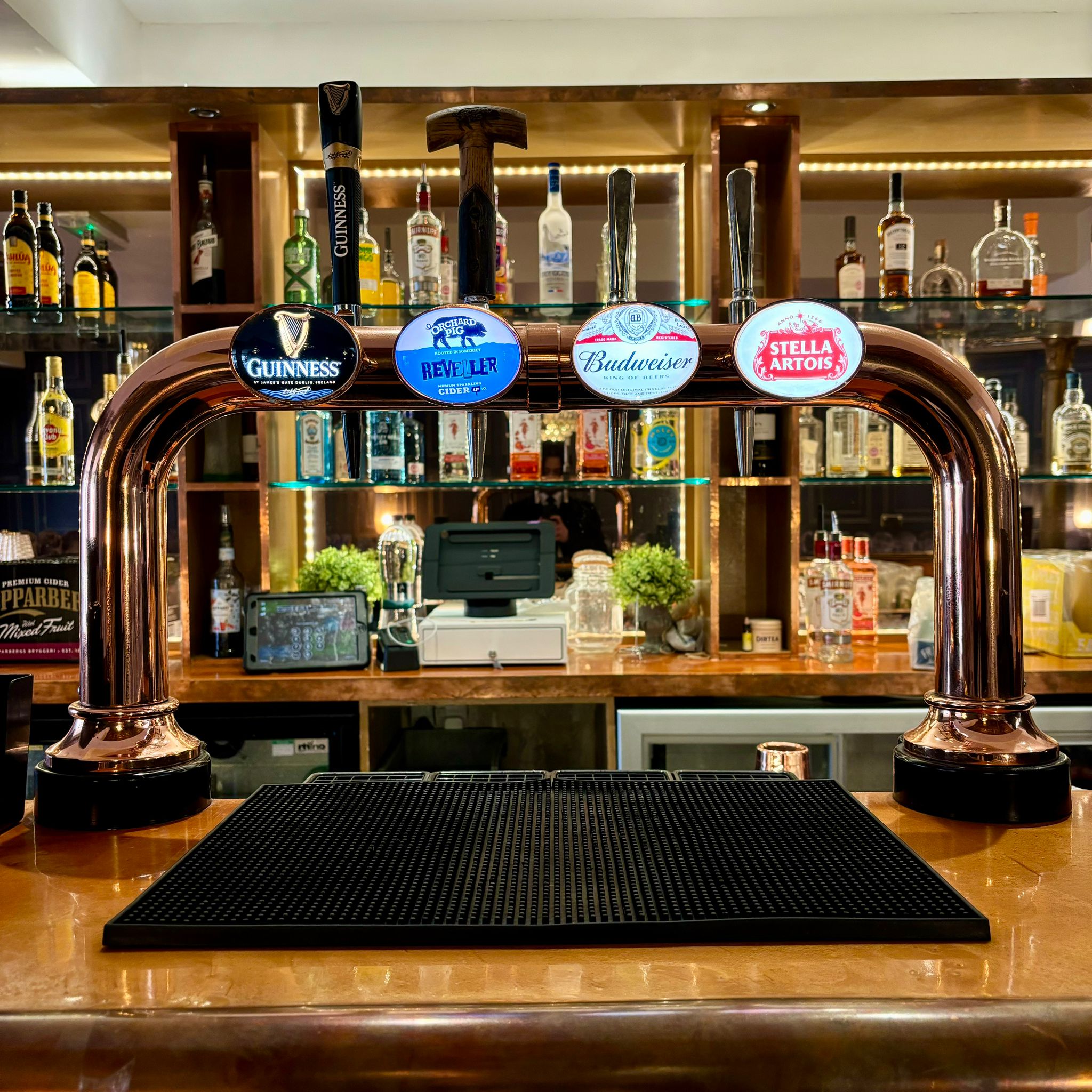 Function Room at Sinclairs Bar with sleek beer tap, perfect for events and networking.