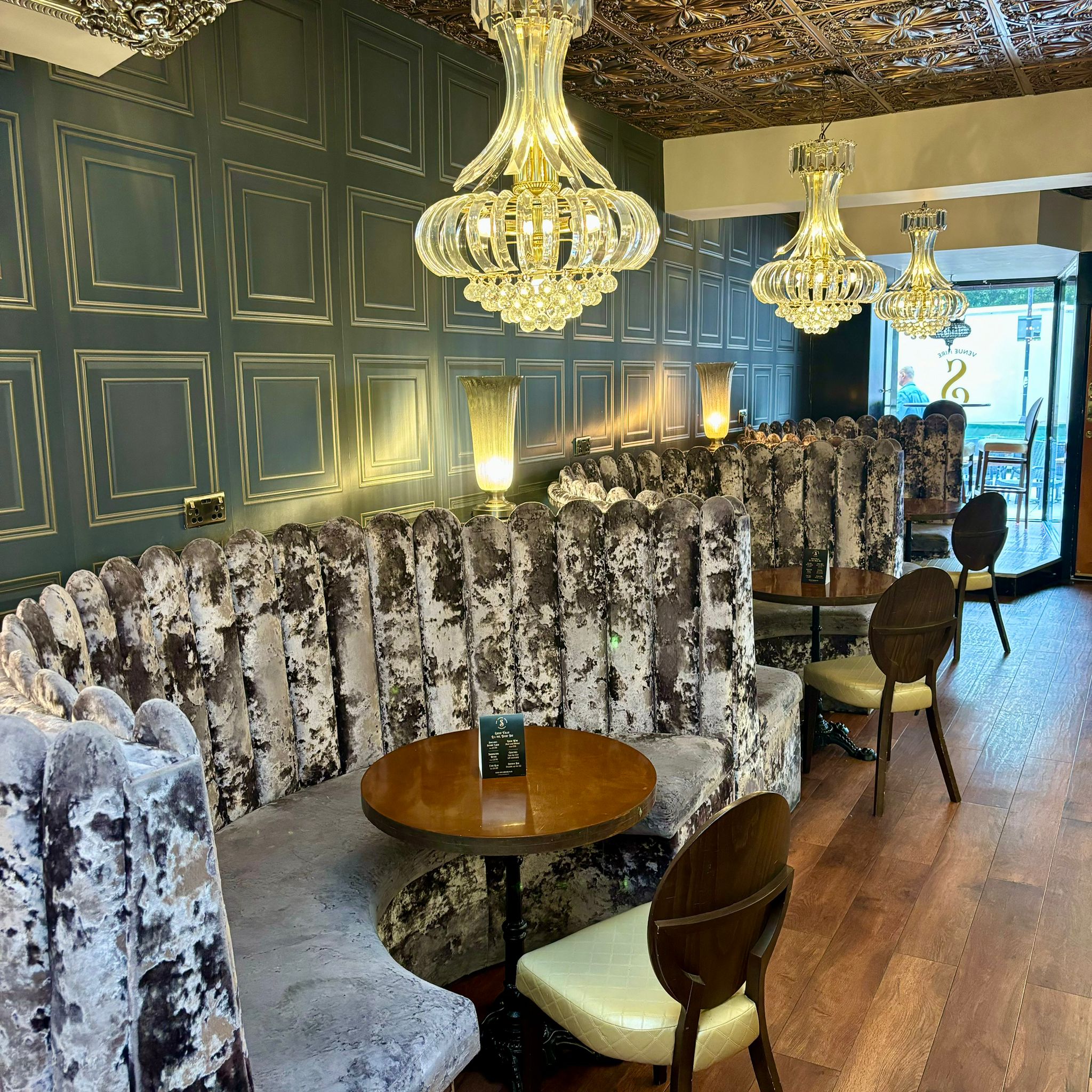 Elegant function room with plush seating, perfect for intimate meetings and events.