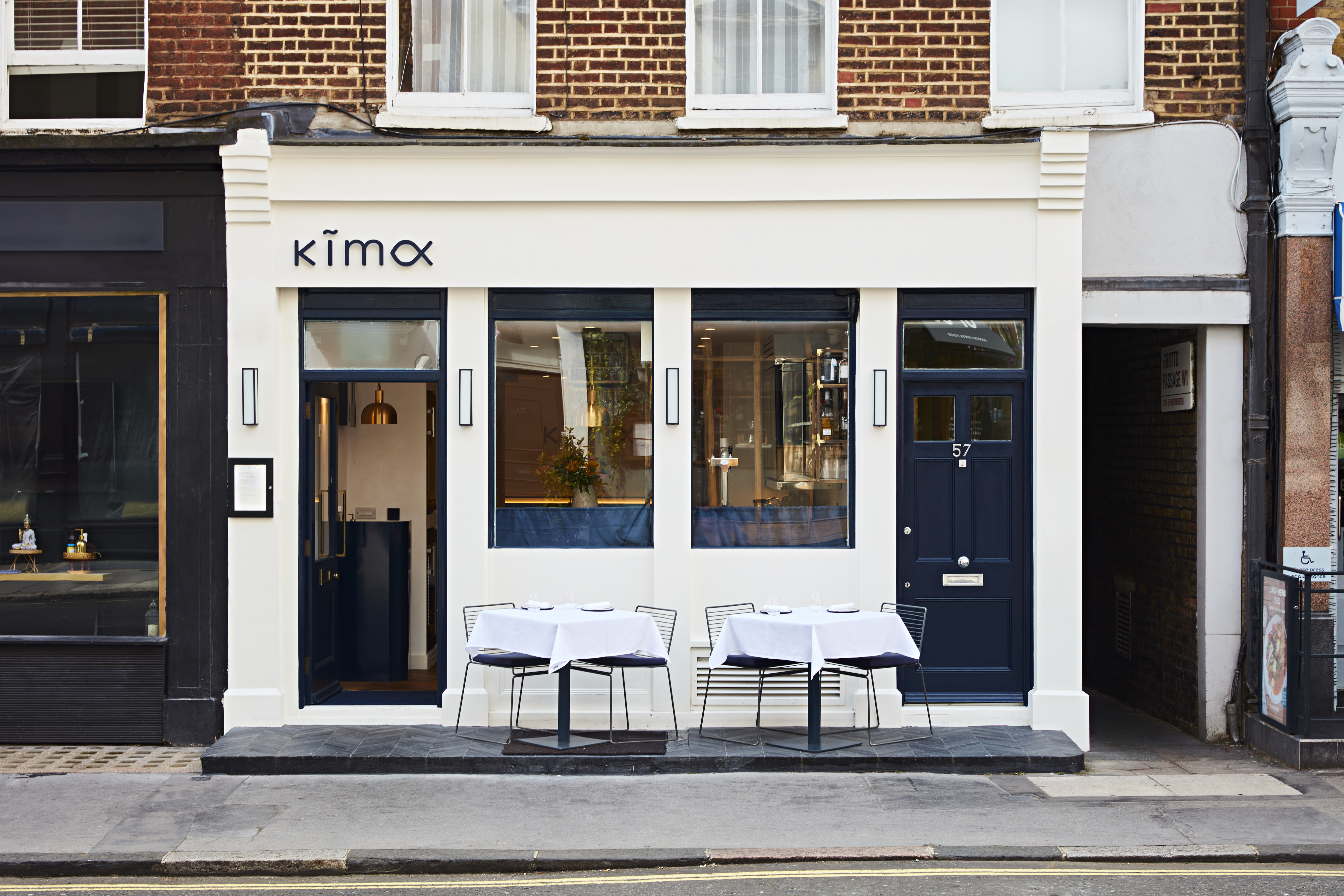 Private dining area at Kima Restaurant, modern design for intimate gatherings and events.