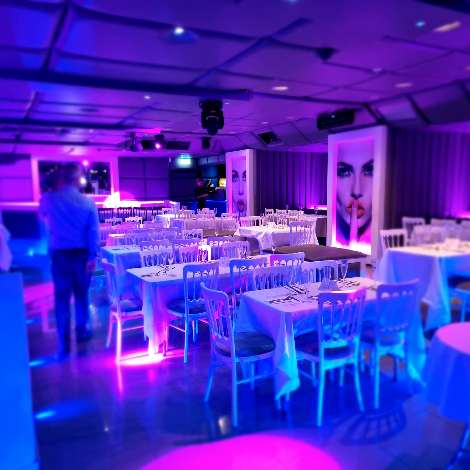 Vibrant event space in Q-Shoreditch with stylish seating for social gatherings.
