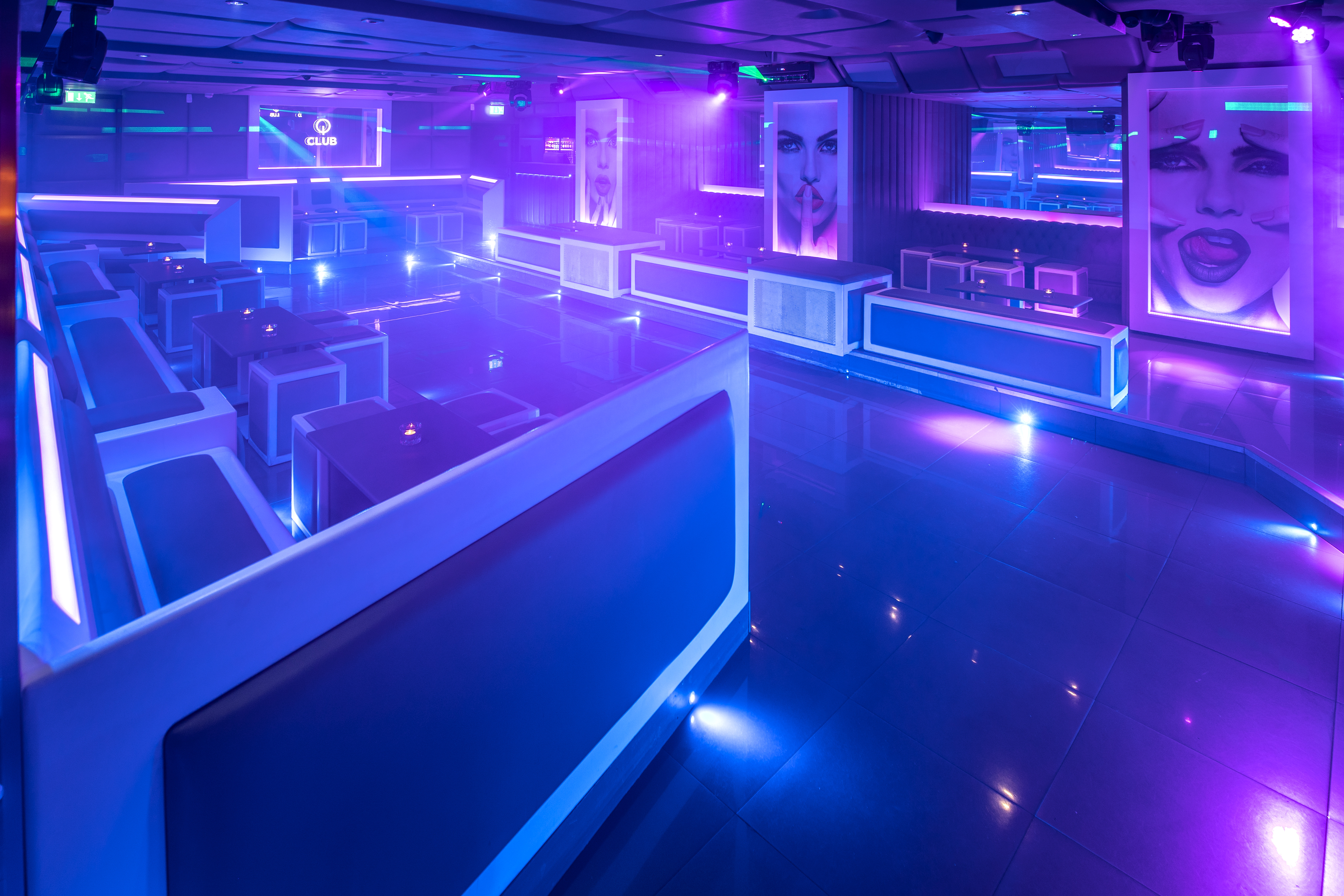 Modern event space in Q-Shoreditch with sleek seating, ideal for nightlife and parties.