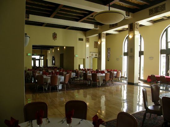 Elegant ballroom with high ceilings, perfect for banquets and conferences.
