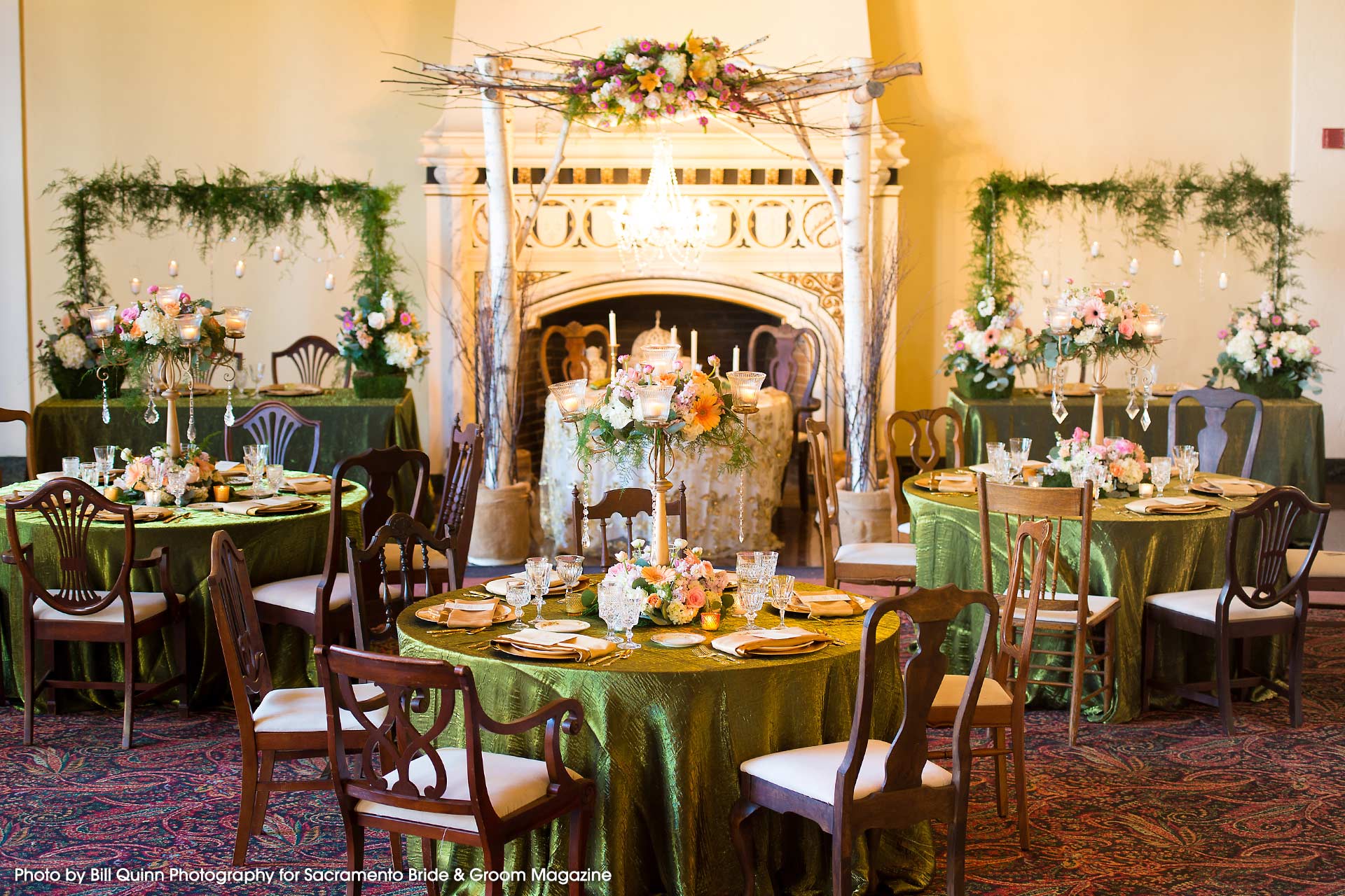 Elegant ballroom with green linens, ideal for weddings and upscale receptions.