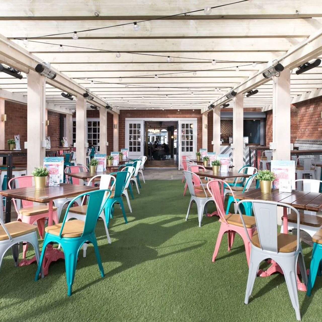 Vibrant outdoor bar at Slug And Lettuce Harborne, perfect for casual gatherings and events.