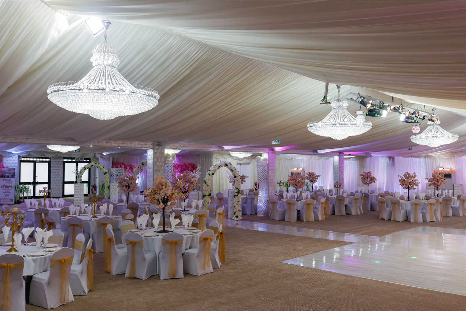 Elegant birthday party hall in Digbeth with white and gold decor, ideal for weddings.