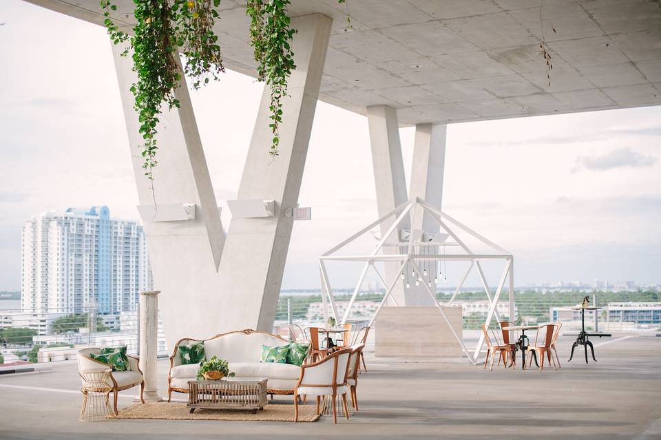 Modern open-air event space with stylish seating at 1111 Lincoln Road for gatherings.