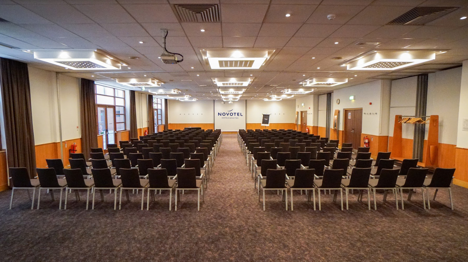 Conference room at Novotel Birmingham Centre, ideal for presentations and workshops.
