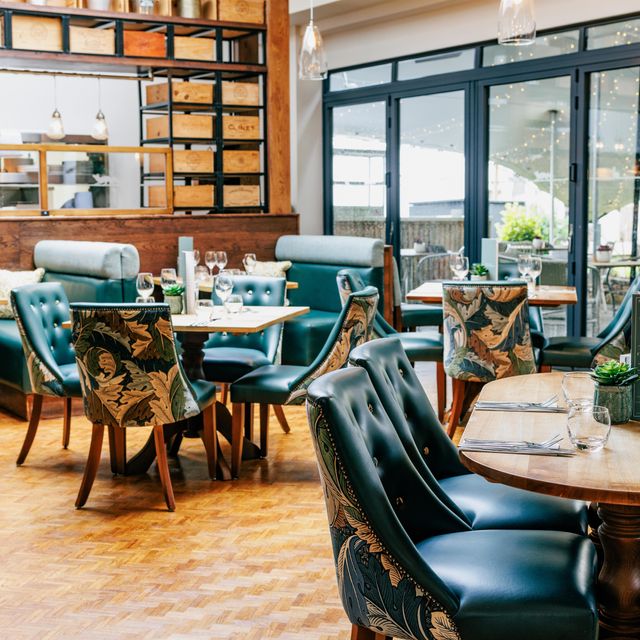 Stylish outdoor restaurant deck for intimate meetings and small events.