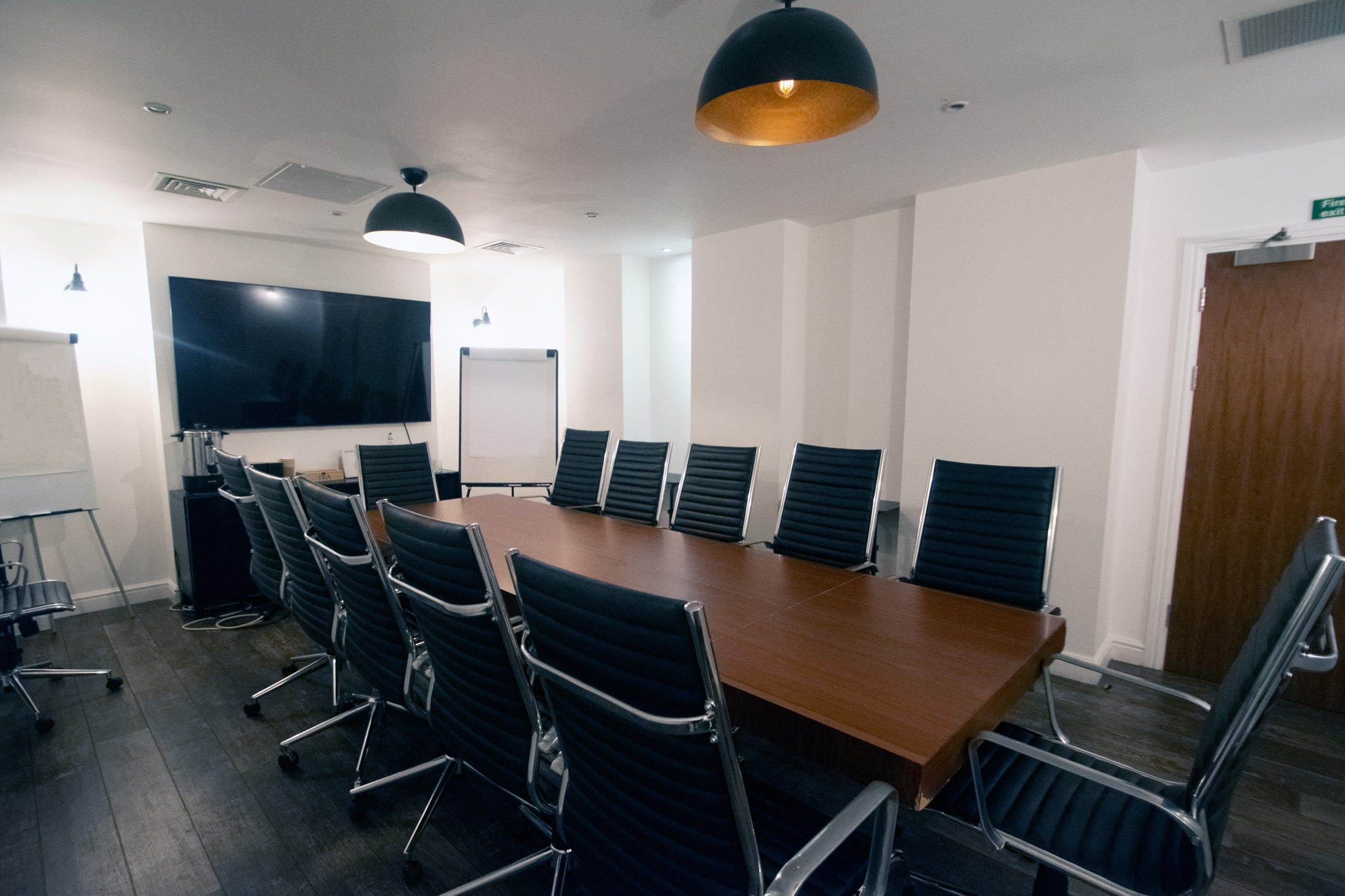 Modern Executive Boardroom at Grosvenor House, ideal for meetings and presentations.