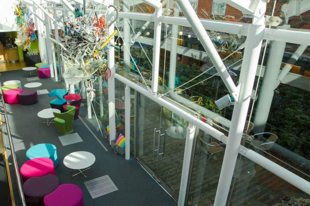 Vibrant Roof Garden event space in Birmingham with colorful seating for networking and workshops.