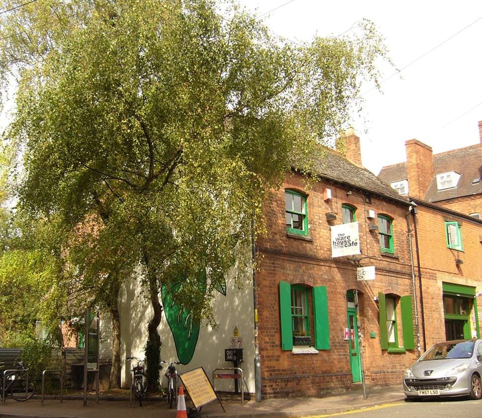 Vesta Living venue with rustic exterior and green shutters, perfect for intimate events.