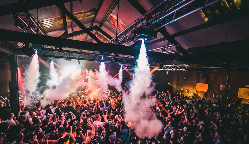 Fabfit event at The Rainbow Venues with vibrant crowd and dynamic lighting.