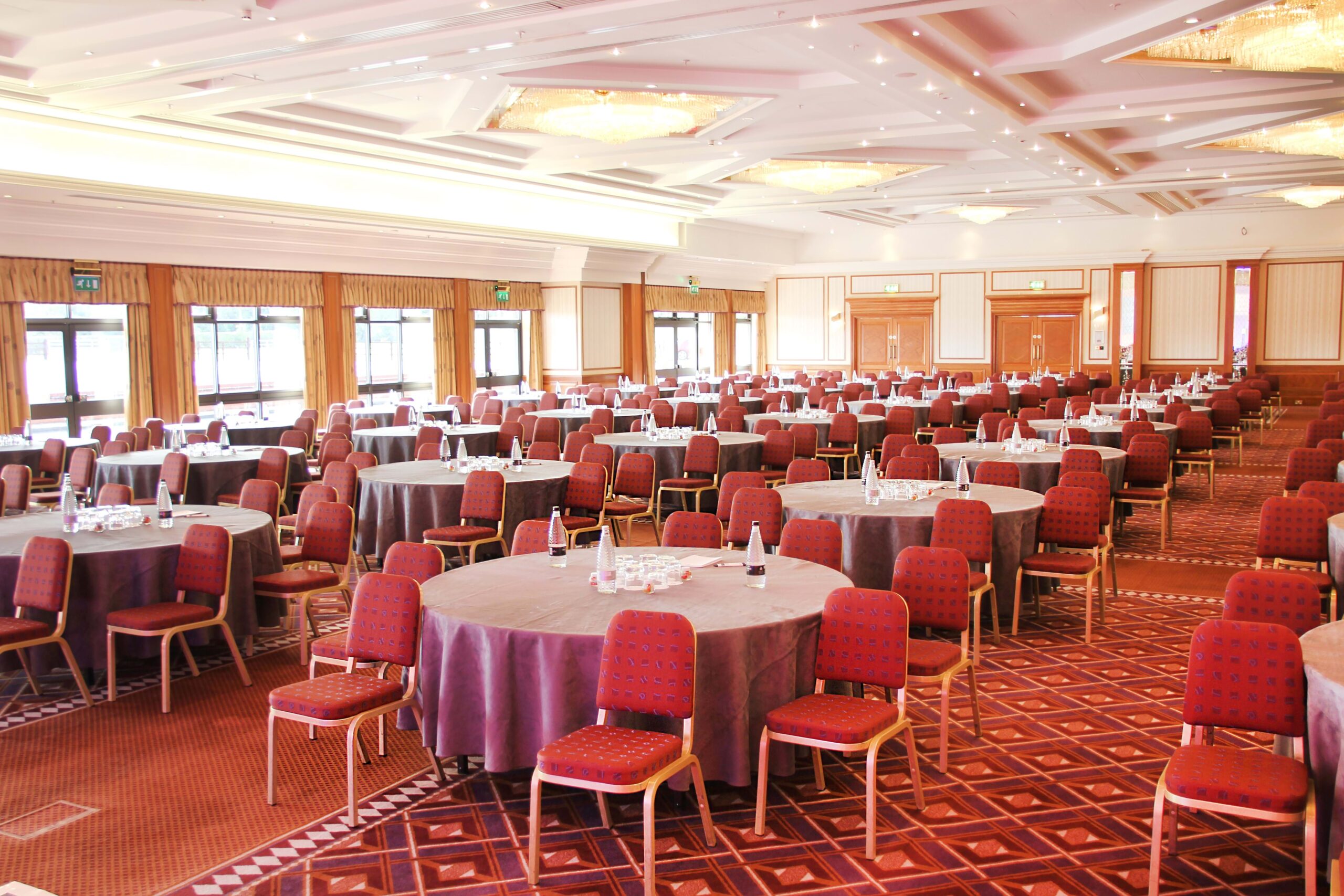 Britannia Suite event venue with round tables, ideal for conferences and banquets.