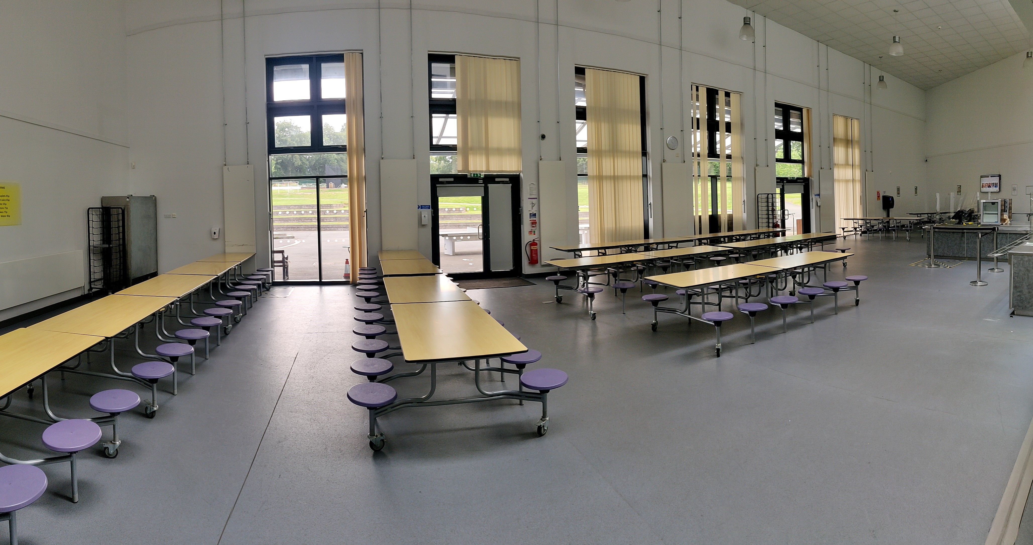 Spacious Harborne Academy Main Hall with natural light, ideal for workshops and gatherings.