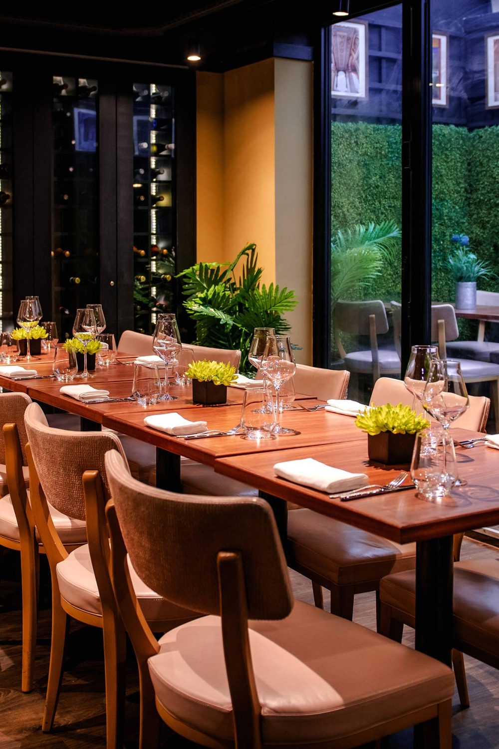 Elegant private dining room with modern decor for intimate gatherings and corporate dinners.