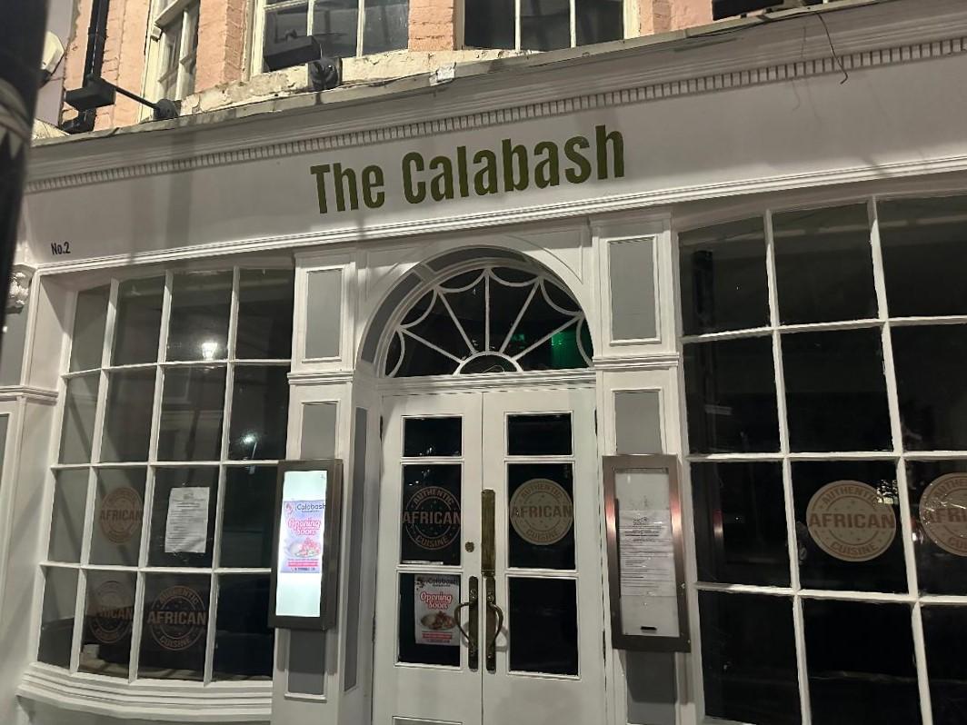 Calabash Restaurant exterior with large windows, ideal for events and meetings.