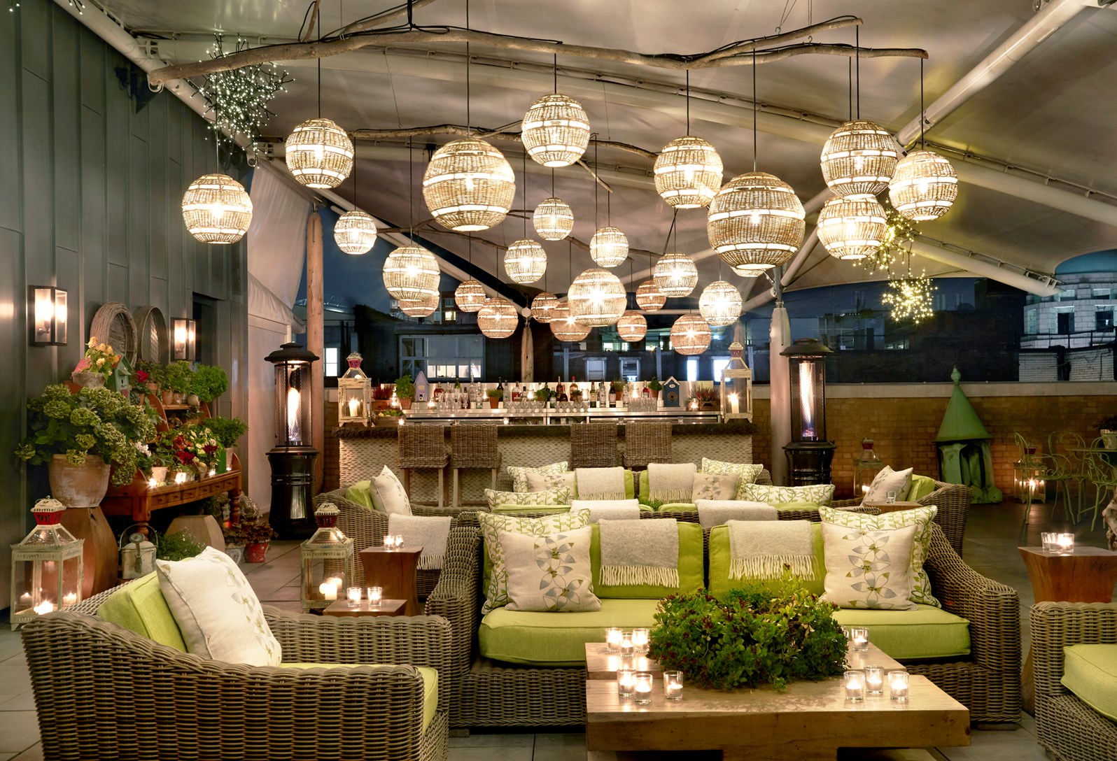 Roof Terrace at Ham Yard Hotel: cozy seating, ambient lighting for elegant events.