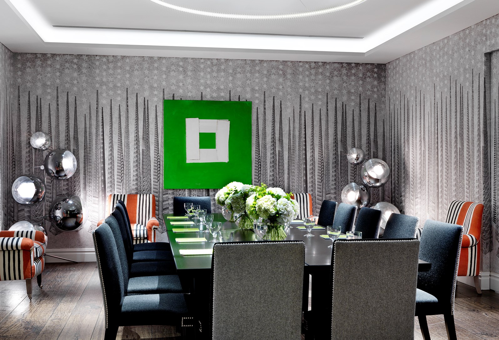 Modern meeting room at The Soho Hotel with vibrant green artwork, perfect for executive meetings.