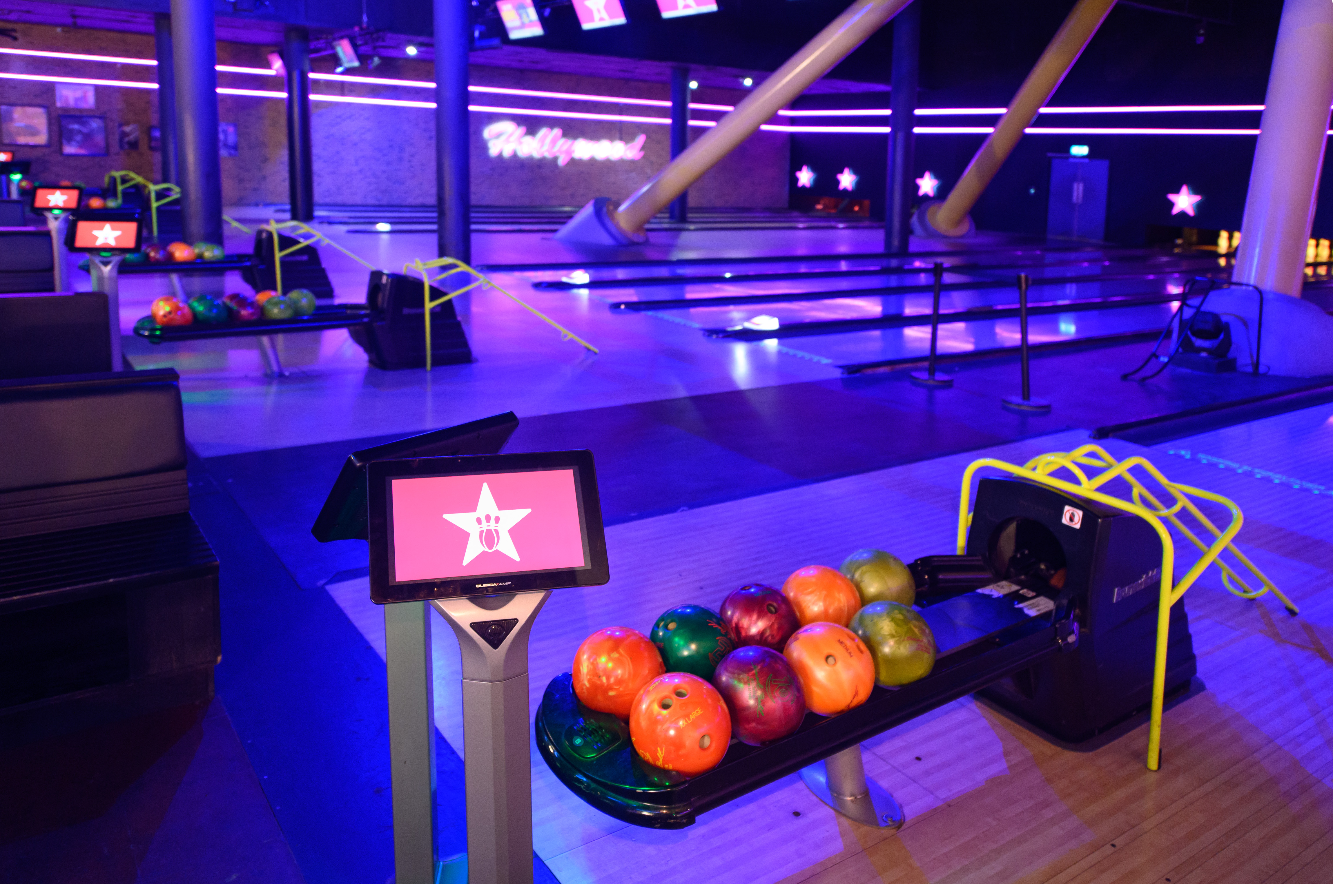 Vibrant bowling alley at Hollywood Bowl O2, ideal for corporate events and team-building.