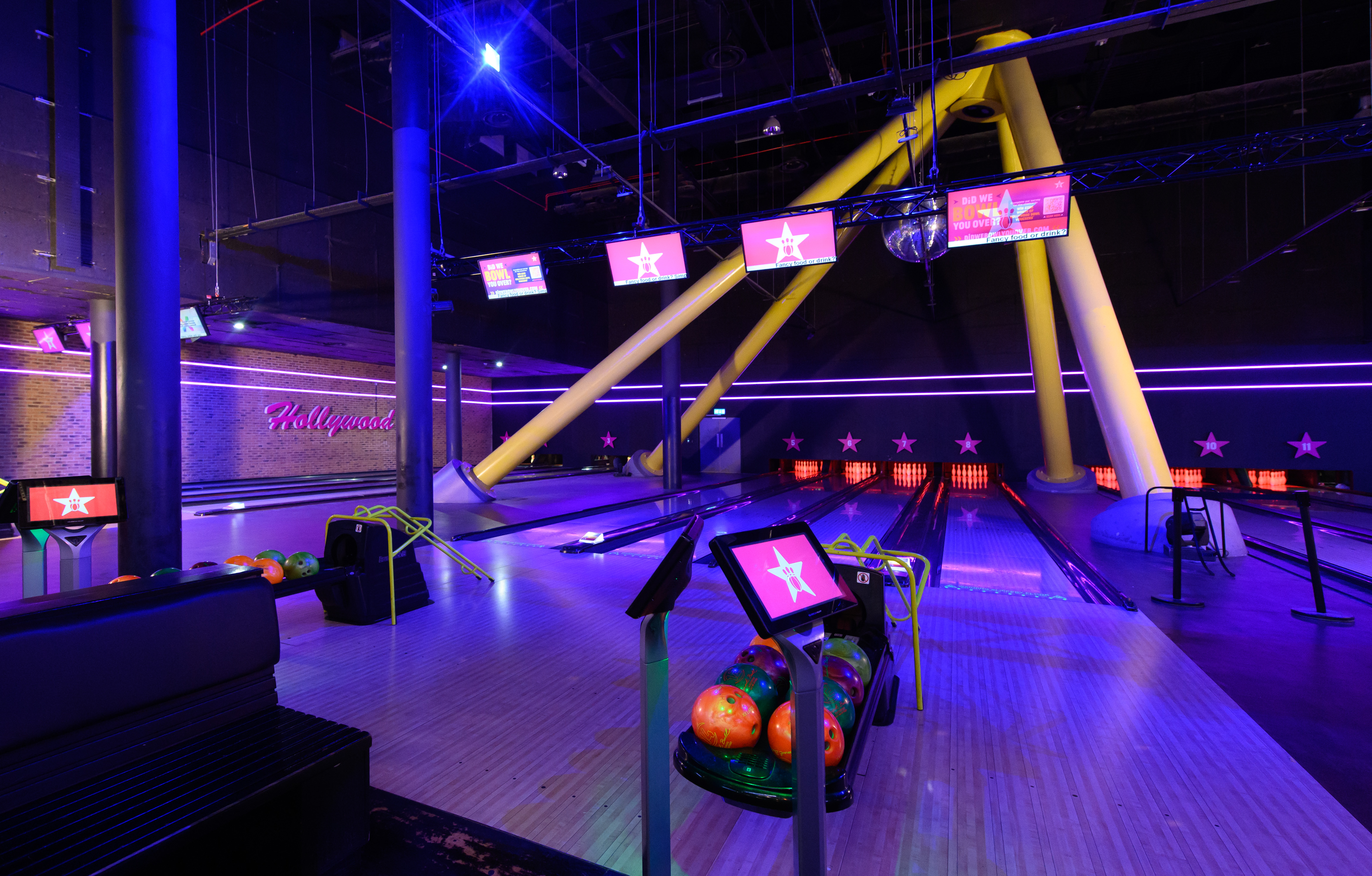 Vibrant bowling alley at Hollywood Bowl O2, perfect for corporate events and team-building.