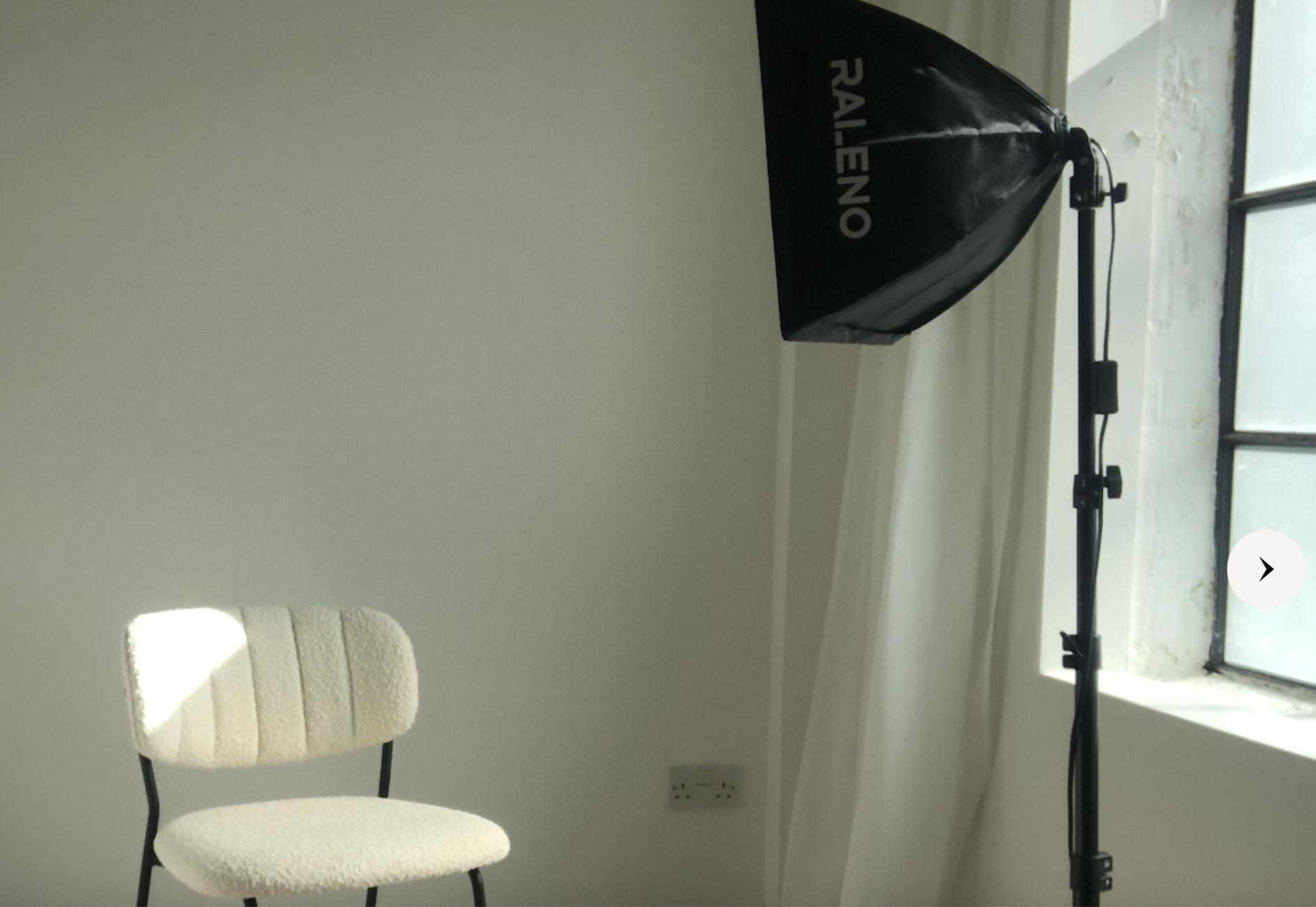 Minimalist meeting space in Sugar Studio Bristol with warm lighting for intimate events.