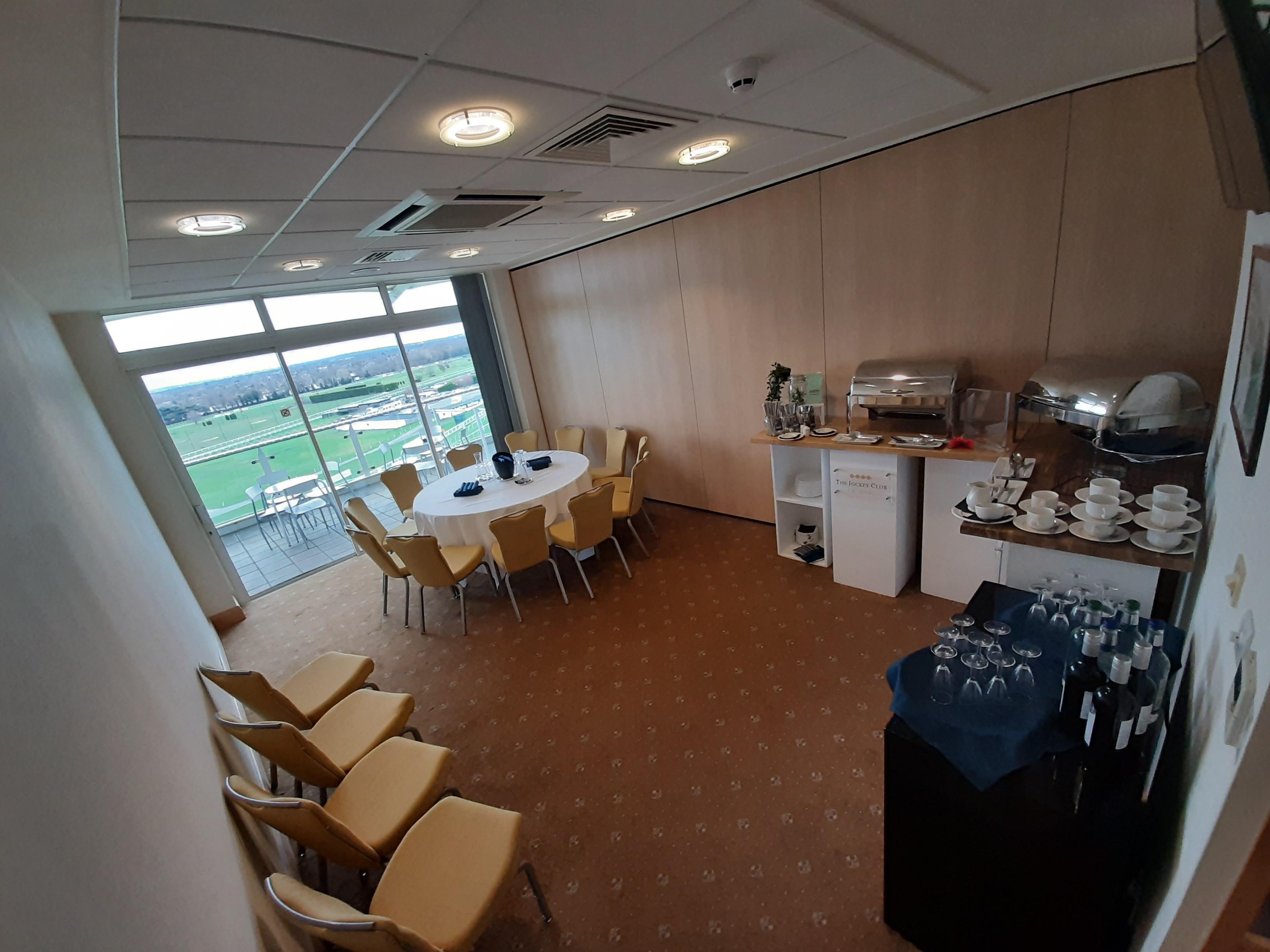 Eclipse Single Box meeting room at Sandown Park, featuring a round table for events.