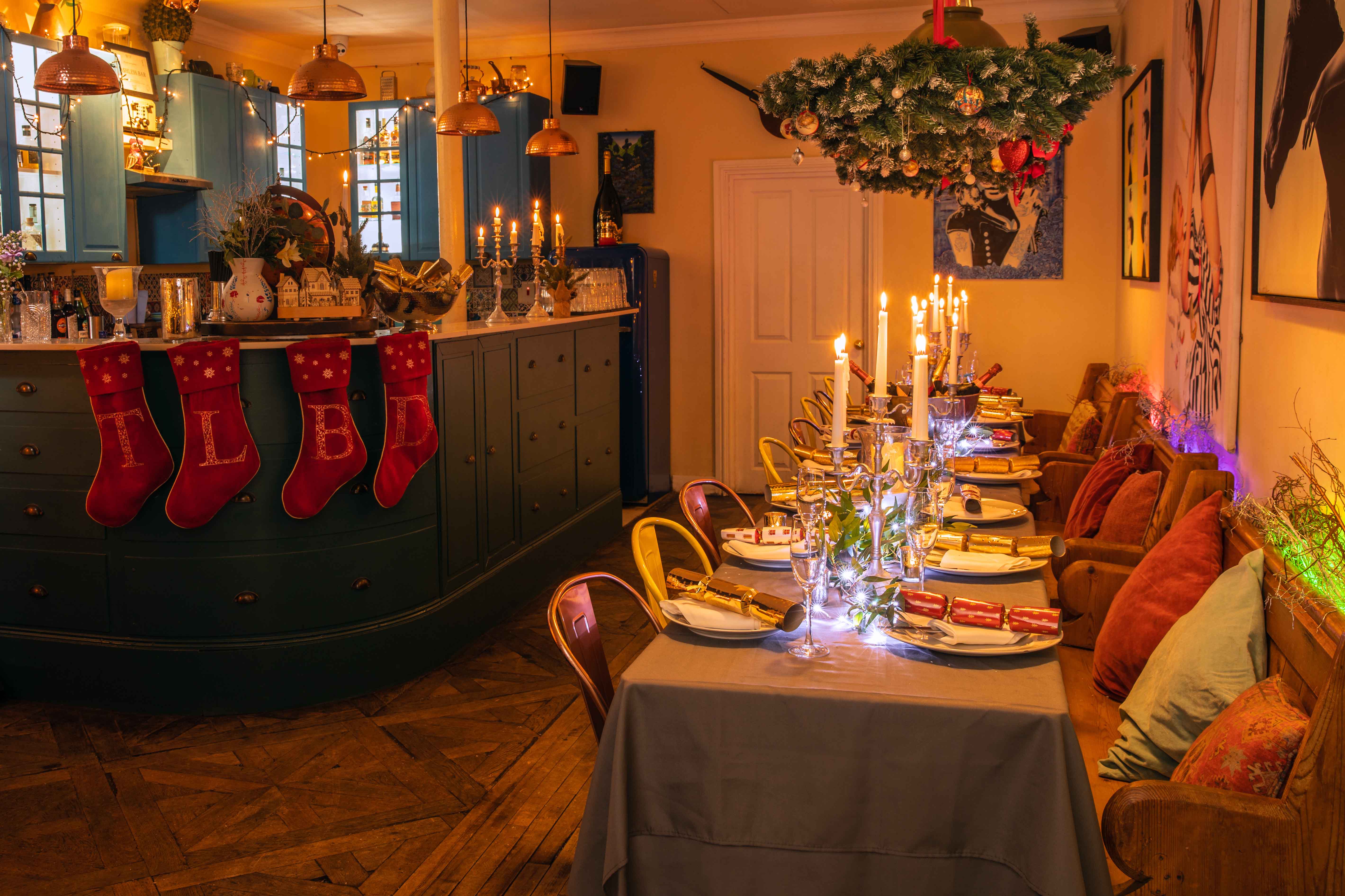 Christmas event space with cozy lighting and festive decorations at The Little Blue Door.