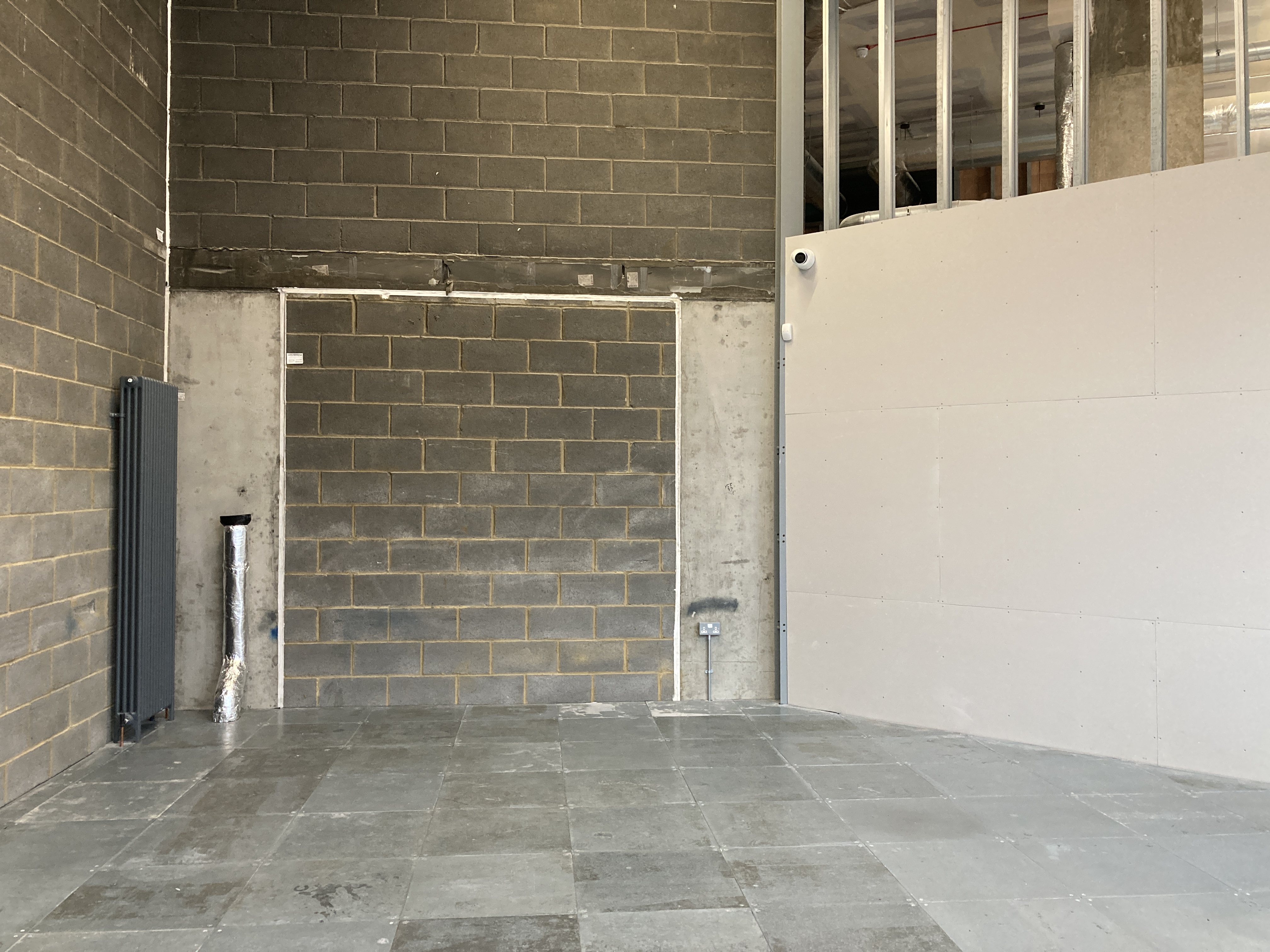 Blank industrial gallery space at Matt's Gallery, ideal for customizable events and themes.