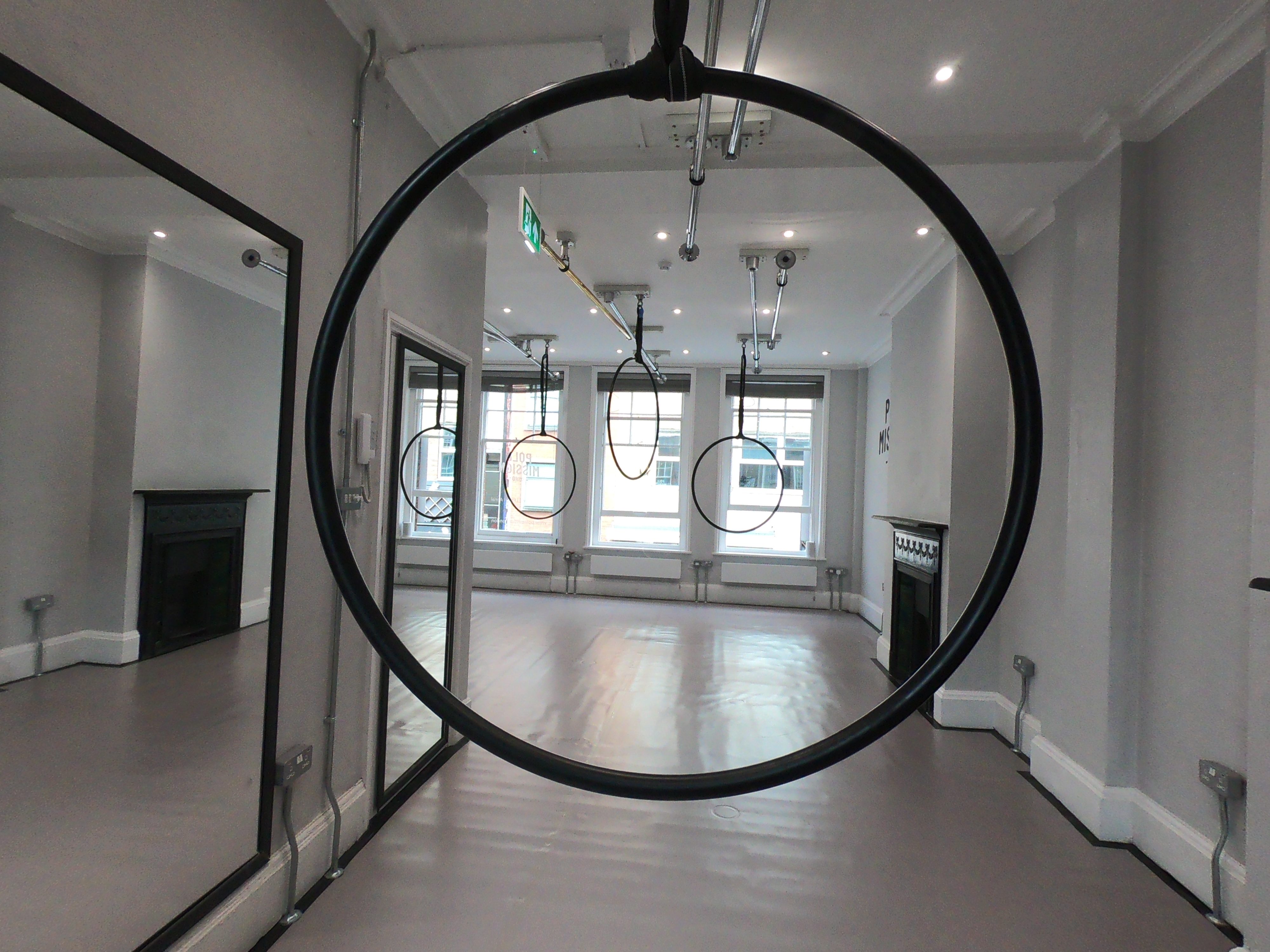 Versatile Pole Mission Soho event space with natural light for workshops and fitness events.