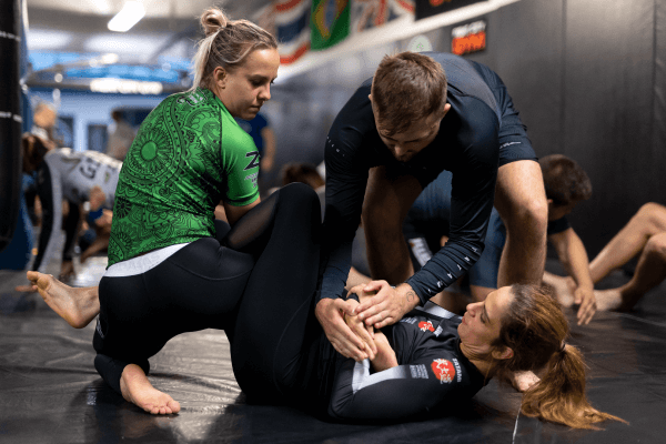 Dynamic martial arts training session at London Fight Academy for team-building events.