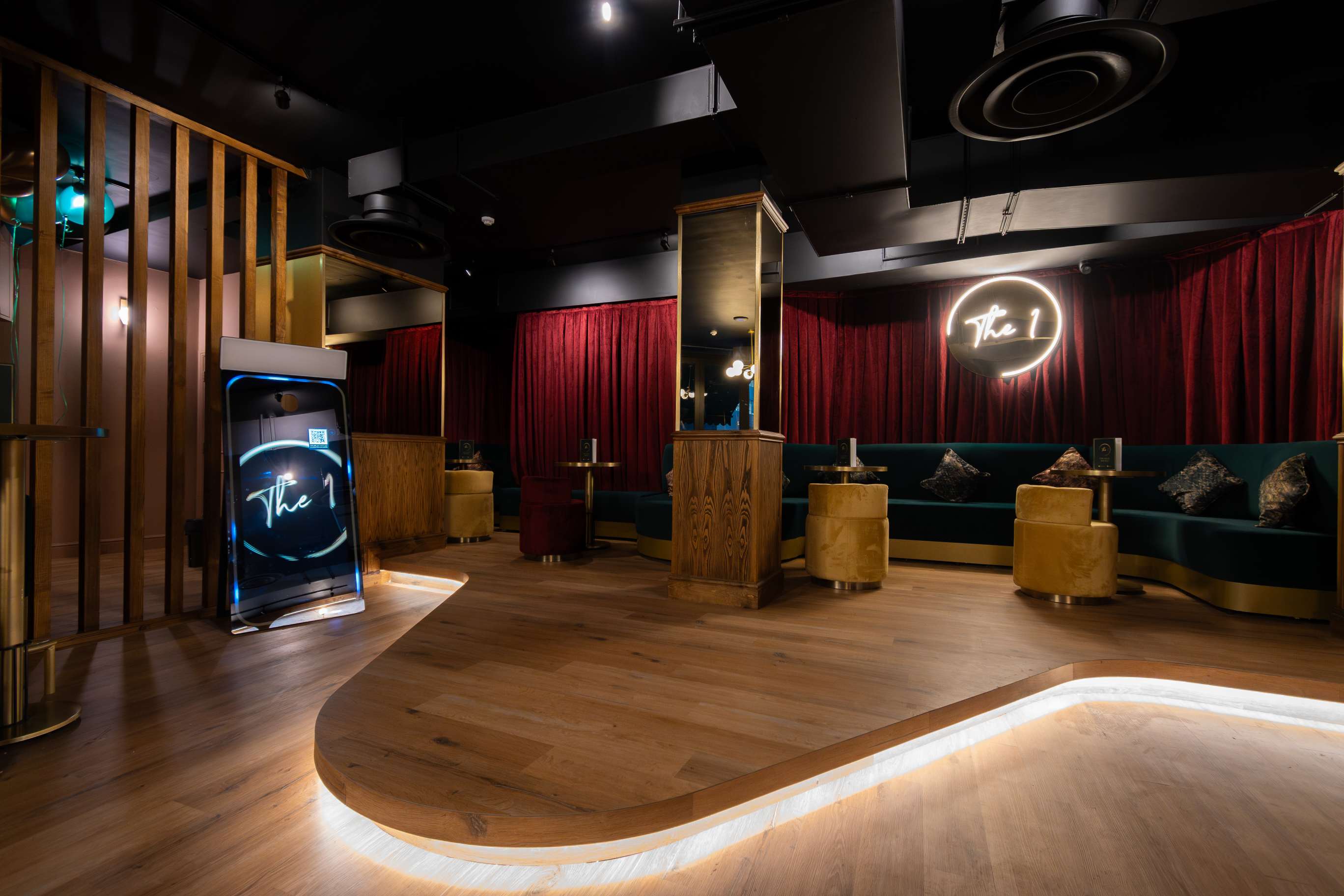Stylish event space at The 1 Bar with plush seating, perfect for networking and gatherings.