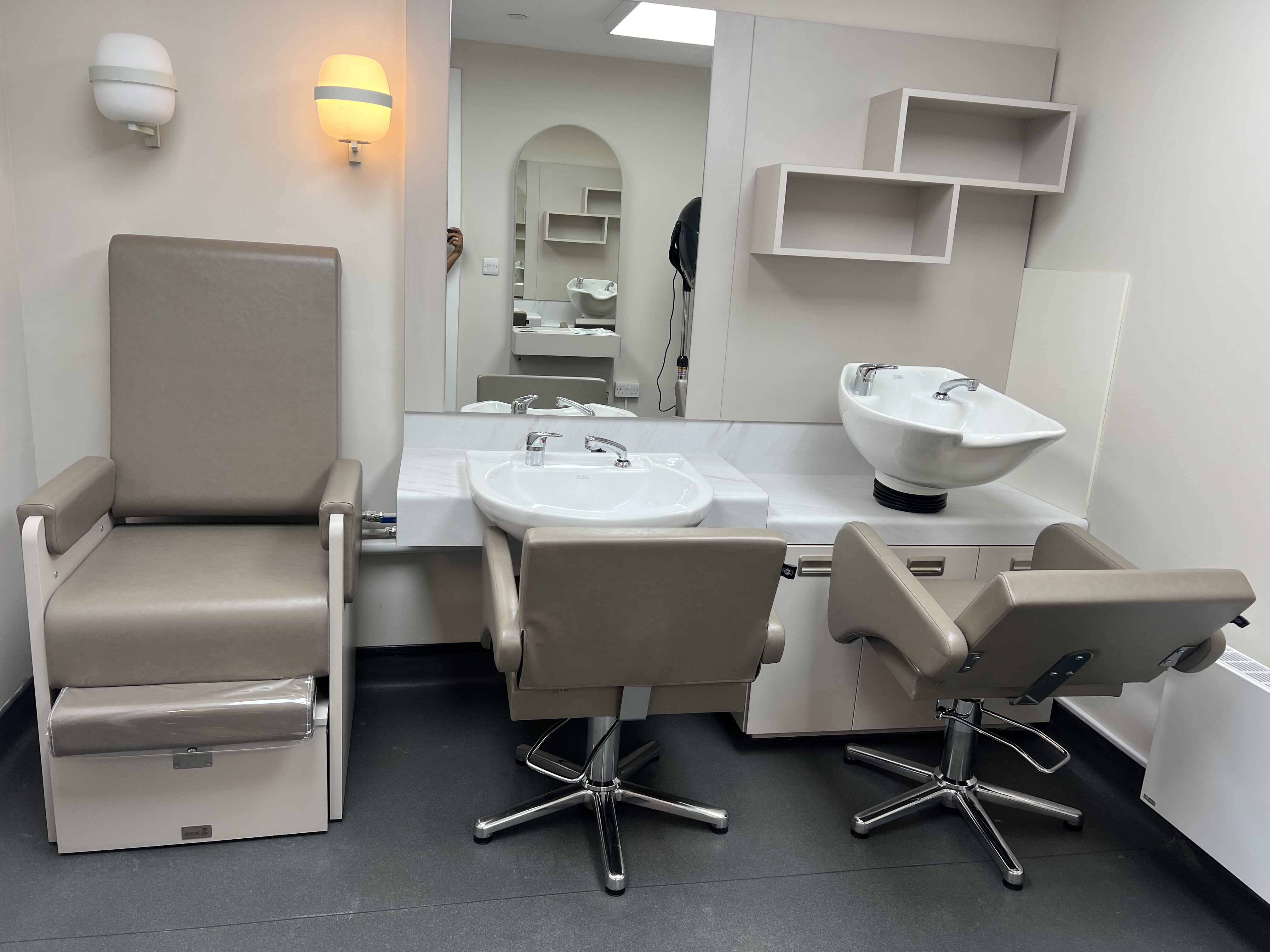 Bermondsey Spa grooming area with sleek chairs for VIP pre-event preparations.