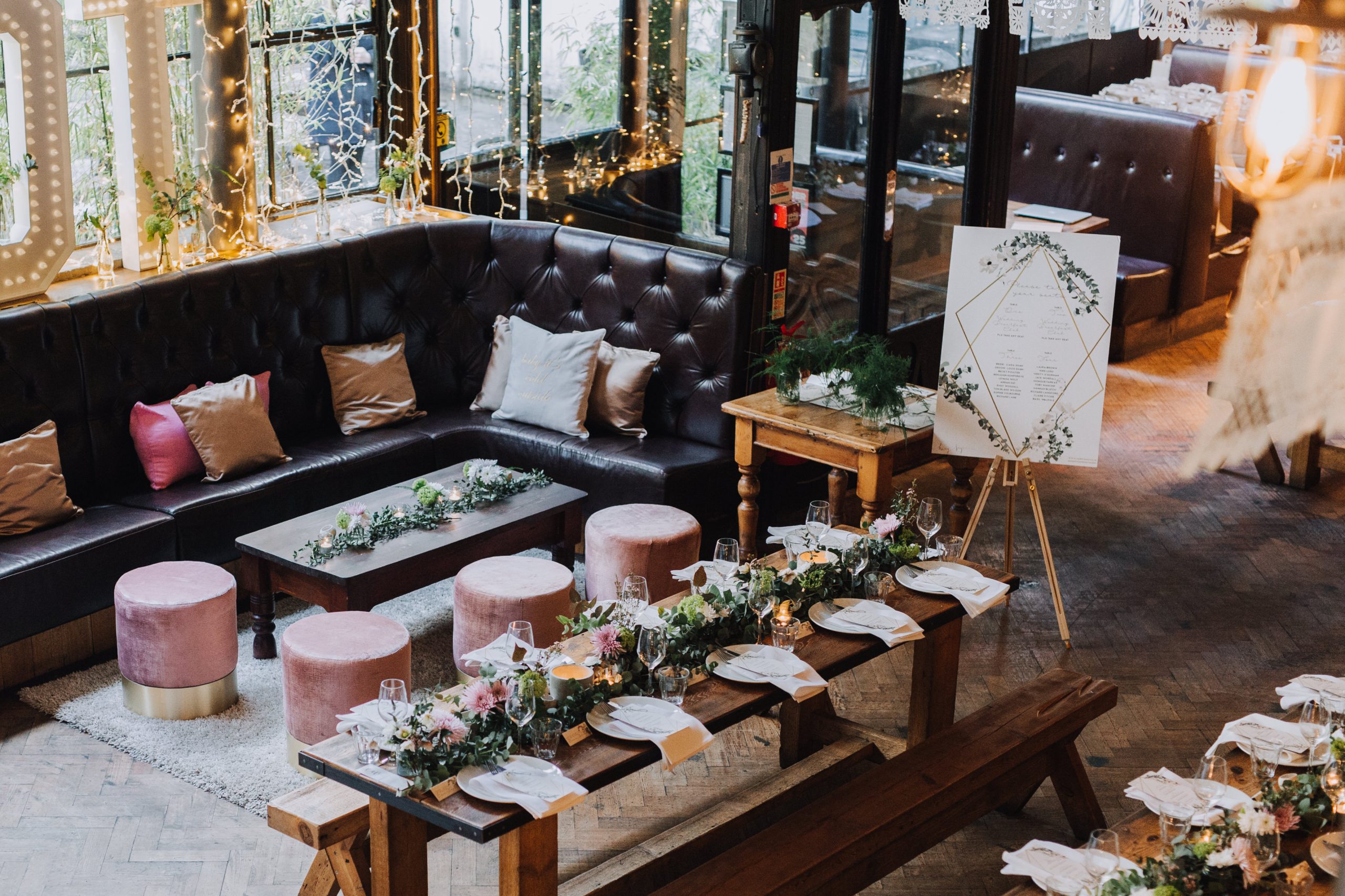 Elegant event space at The Depot N7 with floral centerpieces for gatherings.