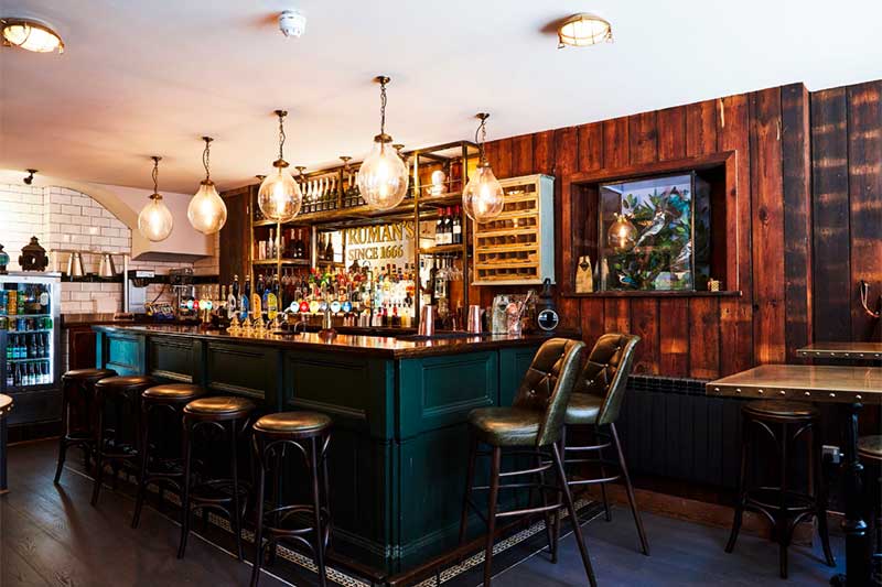 Stylish bar area in The Newman Arms, perfect for networking events and cocktail receptions.
