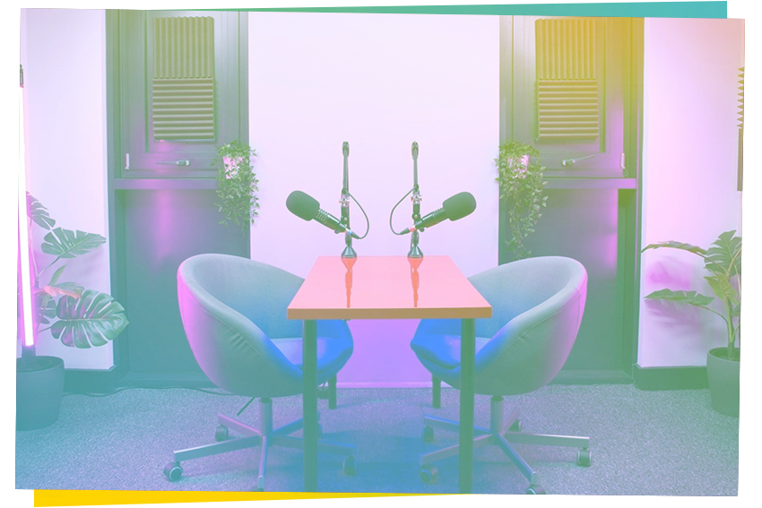 Modern podcasting setup in The Vault with microphones, ideal for workshops and interviews.