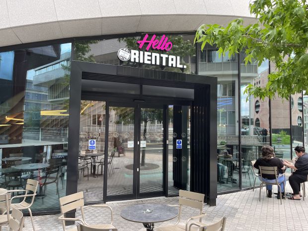 Modern South Pavilion entrance with outdoor seating for events and meetings.