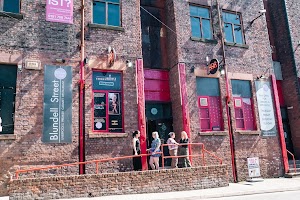 FunnyBoyz Liverpool venue with rustic brick facade, perfect for events and gatherings.