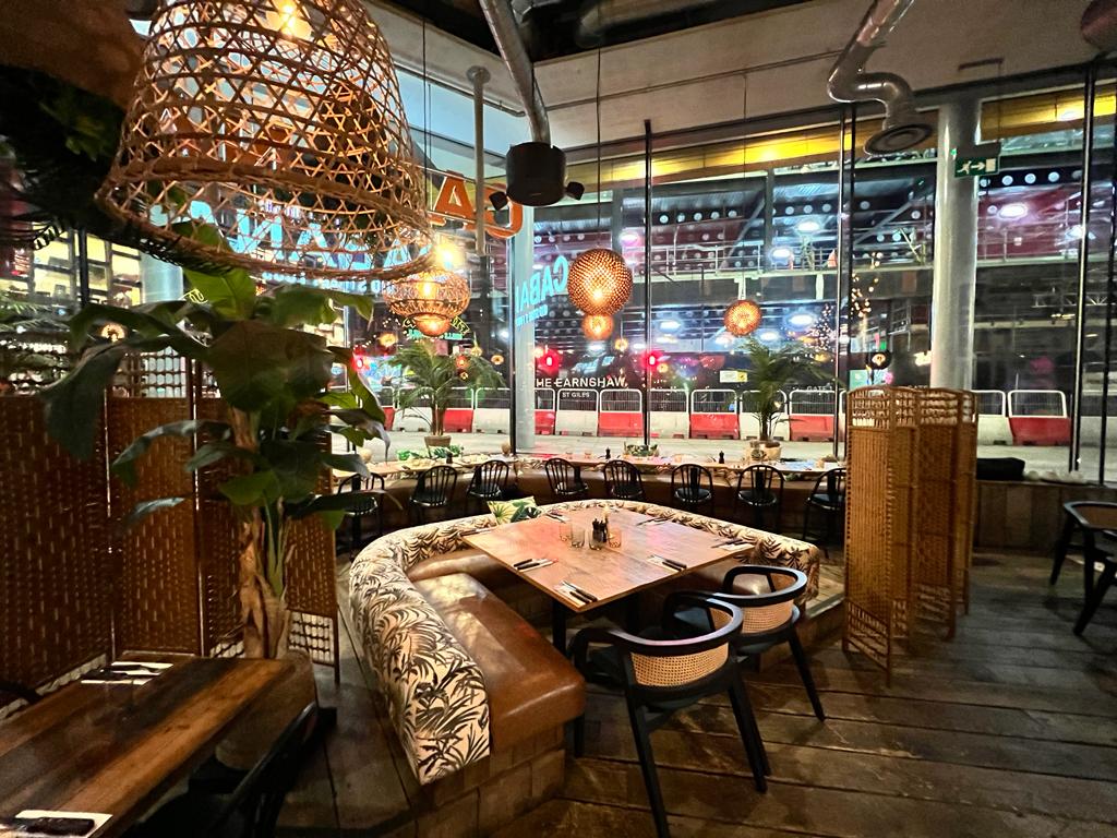 Stylish event space with natural light, ideal for networking and private gatherings.