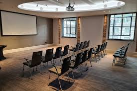 Versatile meeting space at etc.venues County Hall, ideal for presentations and workshops.
