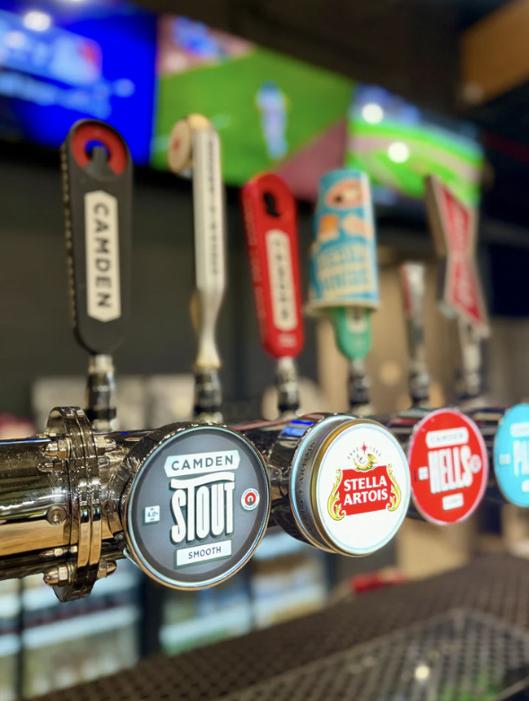 Vibrant beer taps at The 108 for engaging parties and networking events.