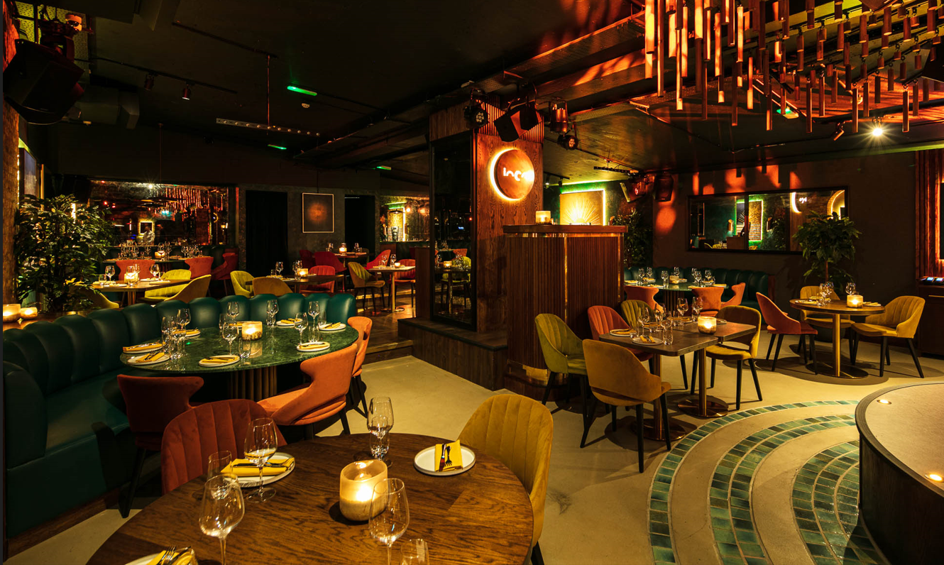 Vibrant event space with elegant tables for intimate gatherings and upscale dinners.