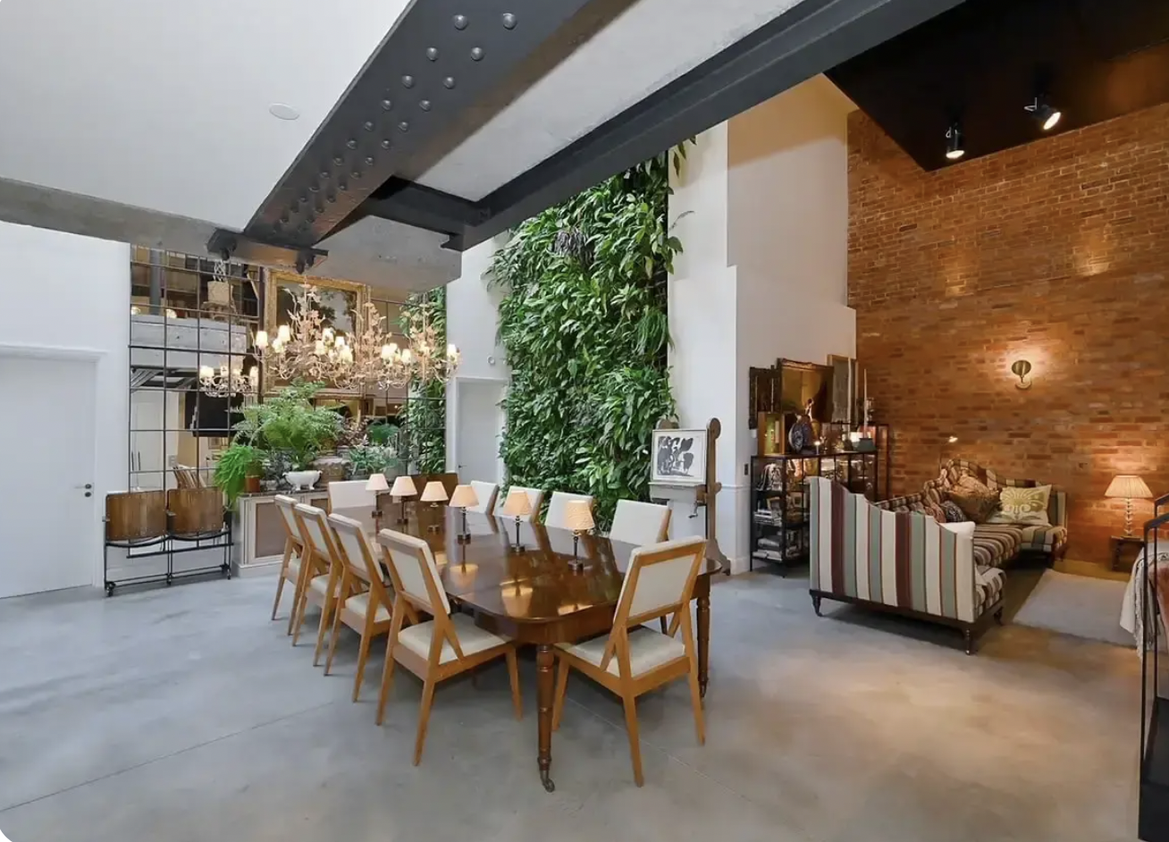 1900s Brewery Cooperage Loft with wooden table, ideal for intimate corporate events.