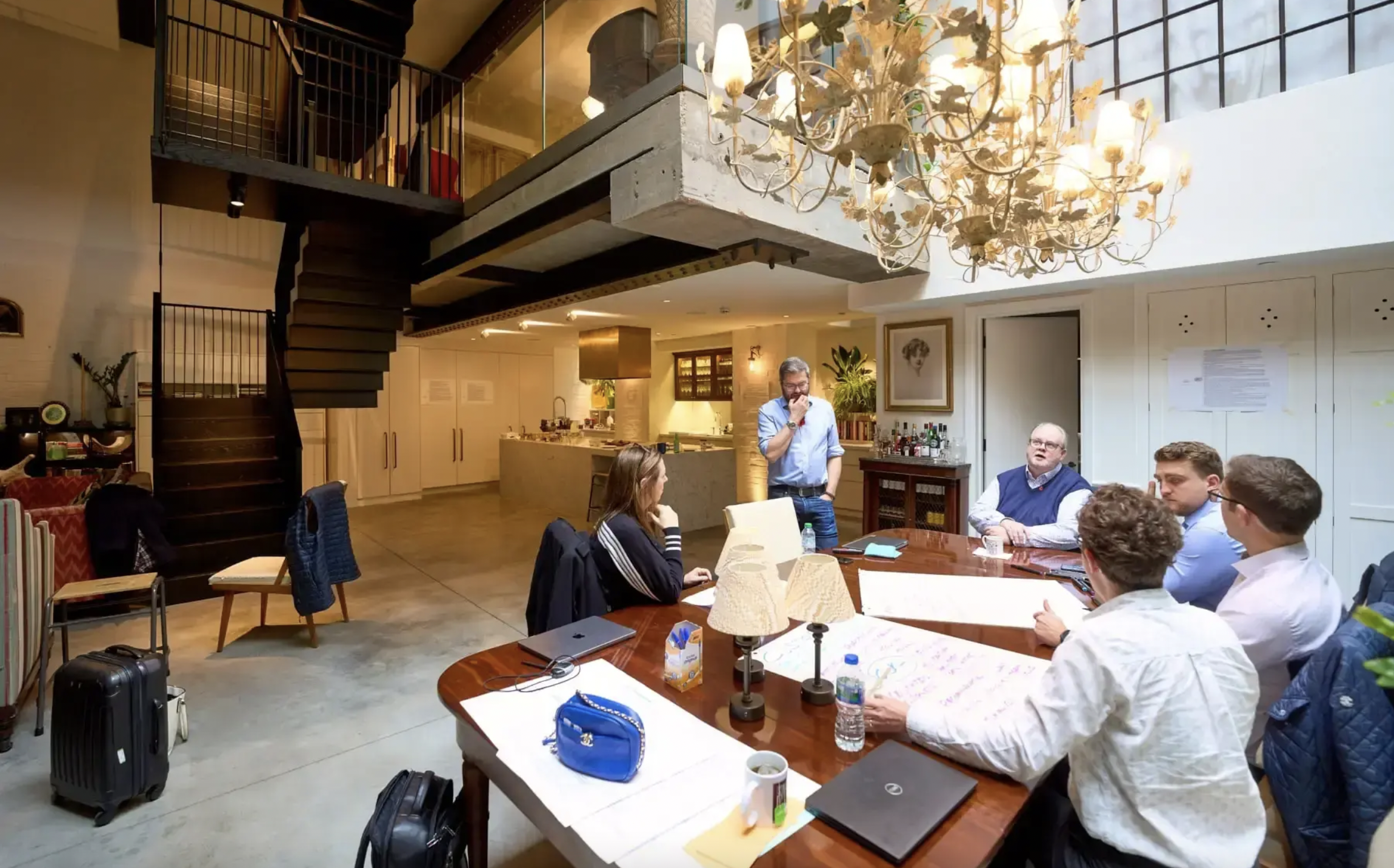 1900s Brewery Cooperage Loft meeting space with chandelier for creative brainstorming events.