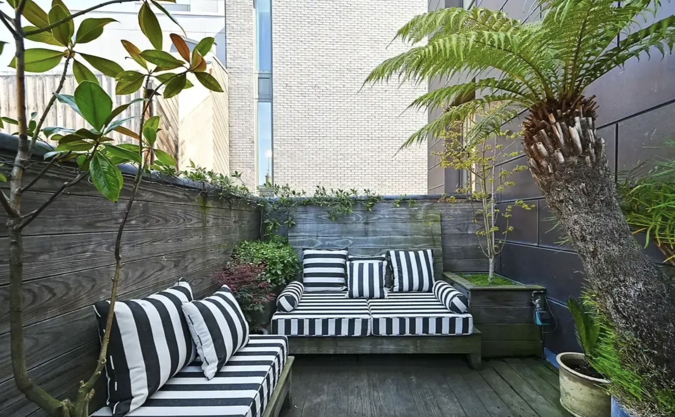Stylish outdoor lounge in 1900s Brewery Loft, perfect for meetings and events.